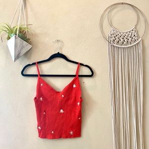 Red tank top. Kendall and Kylie